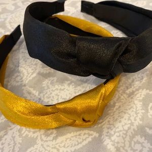 2 black and mustard yellow satin headbands